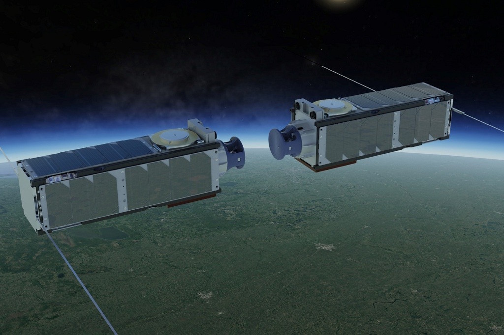 Artist rending of how UND's satellites meet in space to dock